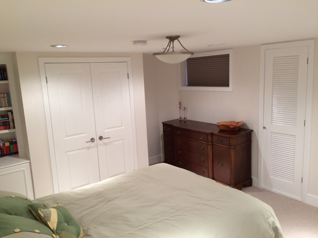 Basement room, new doors, trim around windows and doors, baseboards