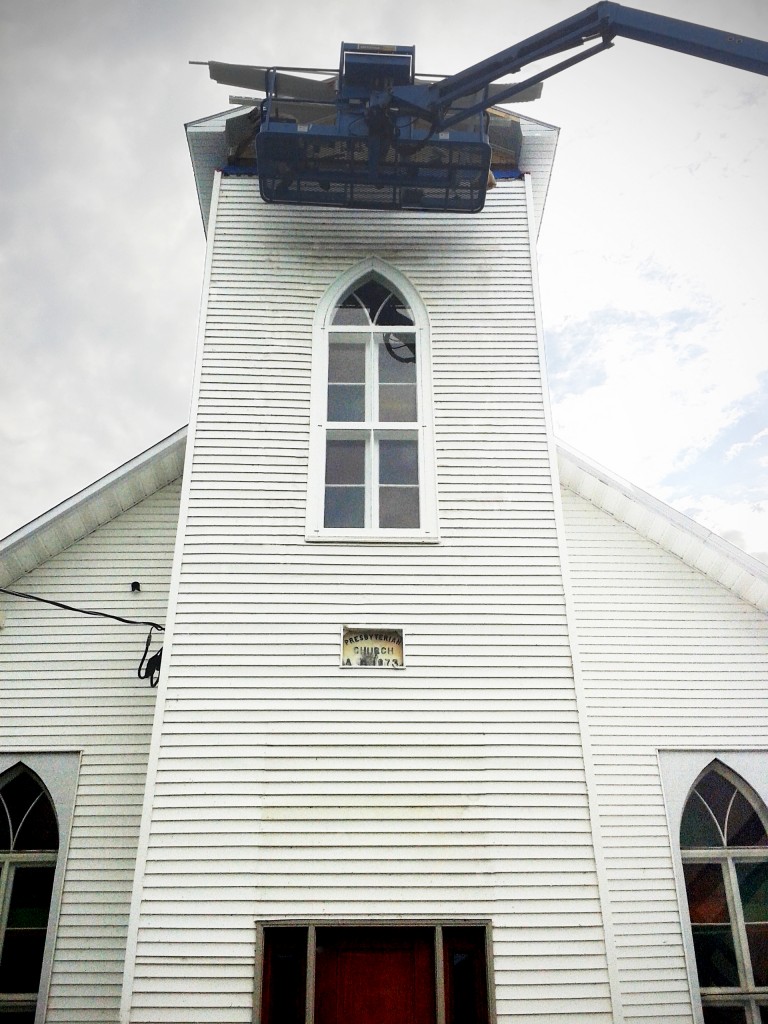 installation of restored church window